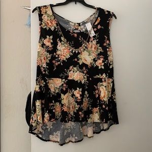 Free kisses peplum sleeveless top